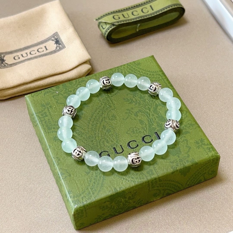 G*u*i bracelets